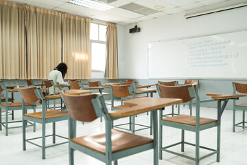 Students Taking Written Exam in Classroom