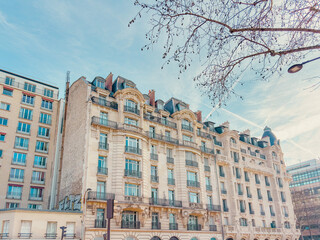 Antique building view in Paris city, France.