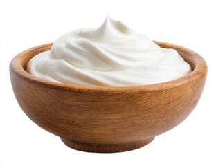 Creamy white swirl of dairy topping in a natural wood bowl