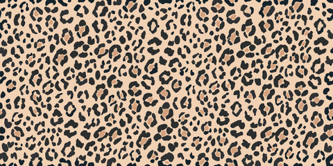 A seamless pattern of dark leopard spots on a light beige background © Ratan