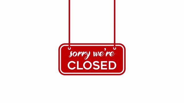 Red hanging sign that says sorry we are closed on white background with subtle motion