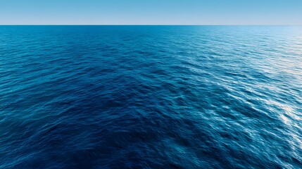 Azure expanse: The open sea, a vast expanse of blue, stretches towards the horizon, where the sky meets the water, creating a seamless gradient of color and space, inducing tranquility