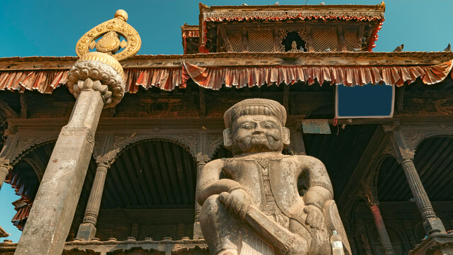 Ancient Stone Warrior Guardian Statue at Dattatreya Temple Nepal with Copy Space