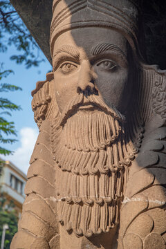 Ancient Lamassu Statue Detail at Parsi Fire Temple in Mumbai with copy space
