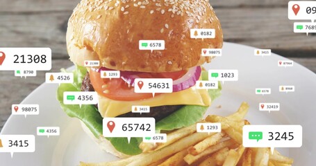 Featuring burger with sesame bun, melted cheese on wooden tabletop, with fries and floating labels © vectorfusionart