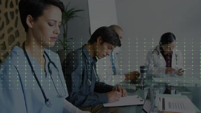 Left doctor typing while team noting, waveform appearing, sweeping across team, showing vitals