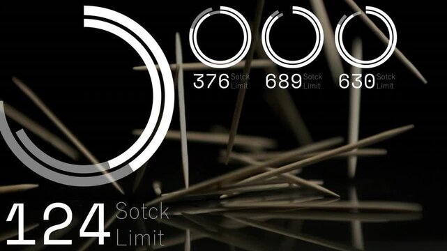 First drop starting sticks falling hitting piling and settling on shiny table while gauges updating