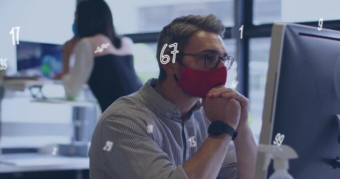 Seated man leaning, clasping chin after analytics update on monitor analyzing animated numbers