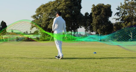 Obraz premium Walking male athlete white outfit dark cap across grassy field, blue cone, digital wave overlay