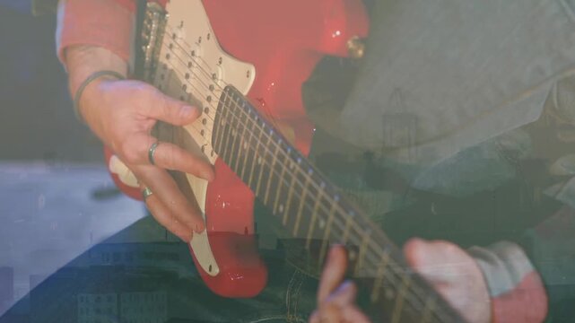 Guitarist resting hand on pickup, mixing picking and strum, shifting for tone on red guitar skyline