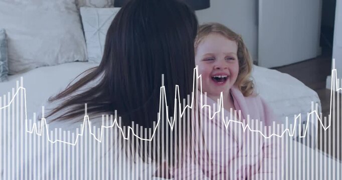 Mother whispering soft rhyme, daughter laughing and cuddling on blankets, forming parenting bond