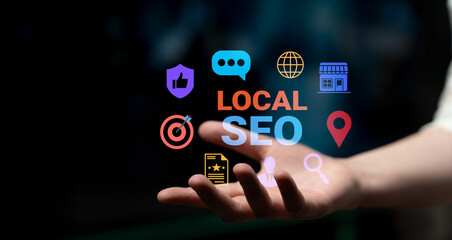 Fototapeta premium A hand extends towards vibrant icons symbolizing local SEO and digital marketing, highlighting the importance of technology in connecting businesses with their communities. Gantry