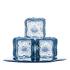 Obraz premium macro close-up of three spherical, glacial blue ice cubes stacked 1 over 2, covered in heavy condensation and frost, isolated on a transparent background with meltwater puddle. concept of ultimate