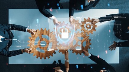 A top-down view of a business team engaging in strategic planning. Gears symbolize collaboration in...