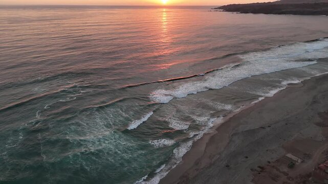 Aerial view of the sunset at the port of Chala in Arequipa, Peru