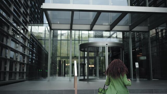 Young modern Business woman Making Phone Call Rushing To Office in the Morning 