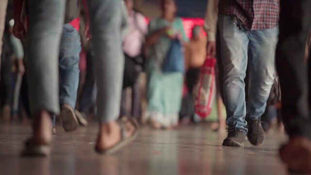 people walking at dadar station in Mumbai