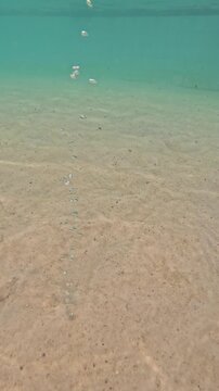 Underwater images showing hot water emerging from the ground. Montezuma, Minas Gerais, Brazil