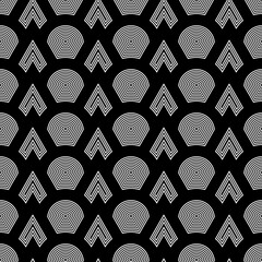 Fish scale wallpaper. Asian traditional ornament with repeated scallops. Repeated white triangular and circular shapes on black background. Seamless surface pattern design with scales. Squama motif. © funkyplayer