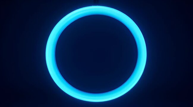 A hypnotic cyan circle glows against a stark, abyssal dark blue backdrop