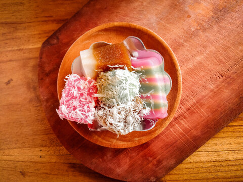 Assorted Traditional Indonesian Javanese snack made from grated cassava called Jajanan pasar, consist of&nbsp;Lapis Singkong or Sentiling, Klepon, Ongol-ongol.