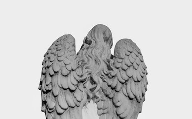 Naklejka premium Stone angel of death with folded wings, symbol of mortality, silence, transition, and the unknown beyond life.