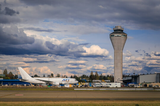 ATI cargo Boeing 767 aircraft and air traffic control tower, SeaTac Seattle, USA