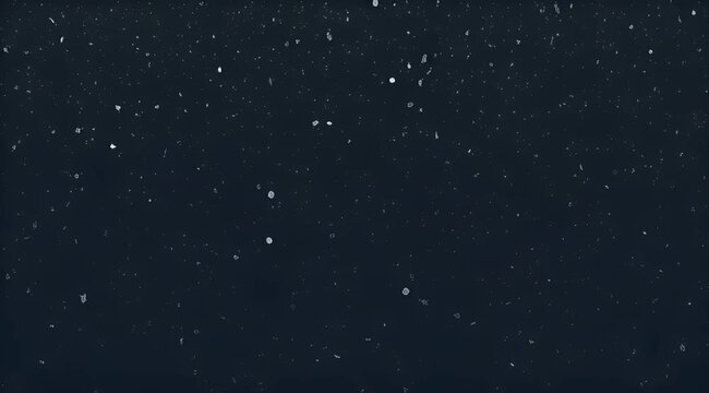 Abstract dark navy sky filled with white speckles resembling stars or dust