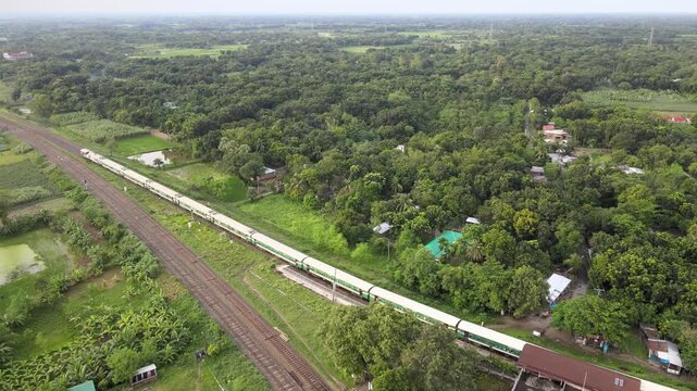 Aerial View of Railway Infrastructure Crossing Agricultural Fields in Bangladesh