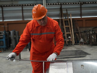 Fototapeta premium engineer team full skill quality for maintenance and training in industry factory worker , warehouse Workshop for factory operators,mechanical engineering team production.