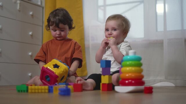 Toddler fun play home kindergarten. Happy kids play with toys learn share moments. Childhood joy, kid playtime home scene. Indoor happy kid play kindergarten. Playful children home educational concept