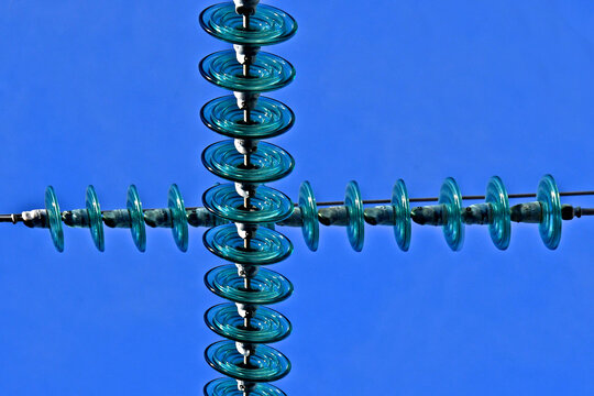 High voltage Tension insulators crossing at 90 degrees 