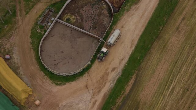 Aerial View of Slurry Tanker Filling from Manure Lagoon in Northern Italy