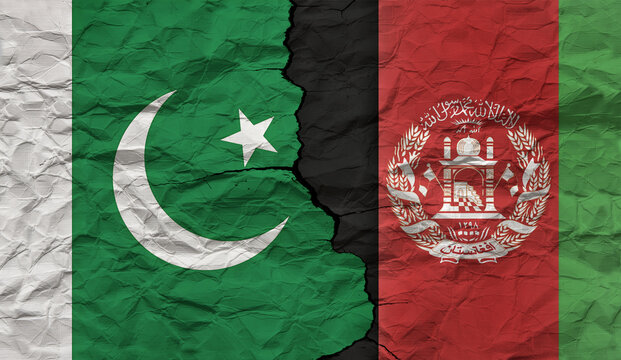 Flags of Pakistan and Afghanistan on a cracked background. Concept of war and political and religious conflict. Pakistan bombs Afghanistan.