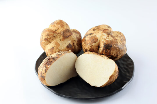 Bengkoang or Jicama Yam on Black Ceramic Plate