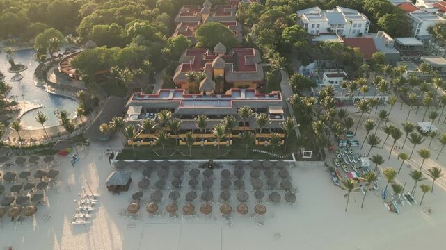 Aerial View of a Tropical Beach Resort at Golden Hour in Playa del Carmen Mexico