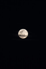 Obraz premium Moon among dark clouds, full moon with dramatic sky 