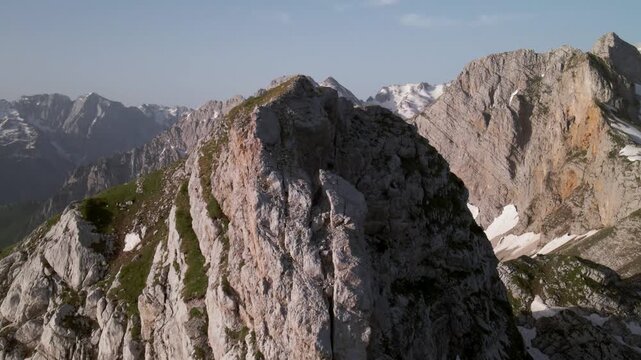 Flying above mountain peak in the Albanian Alps near Valbone valley