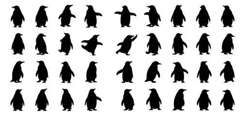 A collection of various penguin silhouettes in different poses and orientations © MSTLIPE