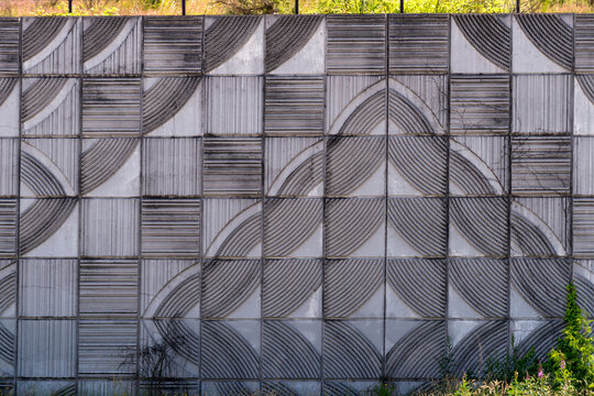 USA, Washington State.  Decorative cement retaining wall beside US Interstate highway 5.