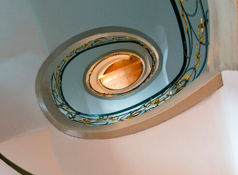 Germany, Berlin. Helical Art Nouveau staircase at the Rosenh&ouml;fe ("Rose Courtyards") at Hackescher Markt. 