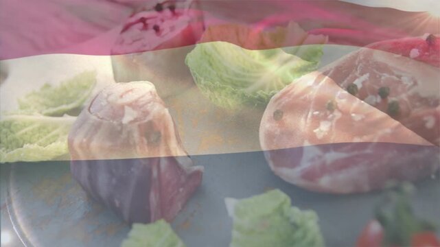 Person's hand holding black marker writing #hashtag on paper as tip touches page for social tag