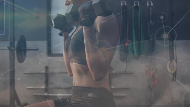 Woman flexing arm in gym, wrapping Born Tough tape and causing tech overlay tracking fitness gains