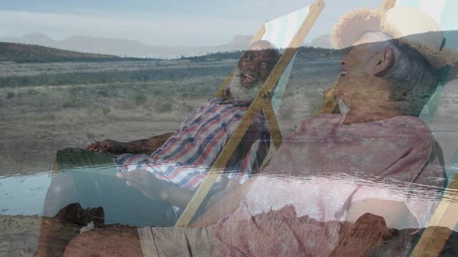 Travel ad showing two elderly men reminiscing on shore dusk sparking animated bubbles above hats