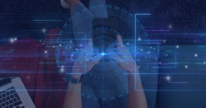 User holding smartphone on lap, tech app running showing rotating HUD overlay monitoring data
