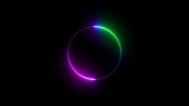 A dark abstract background illuminated by a luminous neon circle split into two halves one radiant magenta and the other bright green showcasing a vibrant color transition in a minimalist
