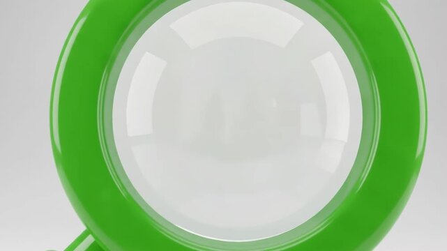 Close-up of a modern circular LED indicator light with green glow.