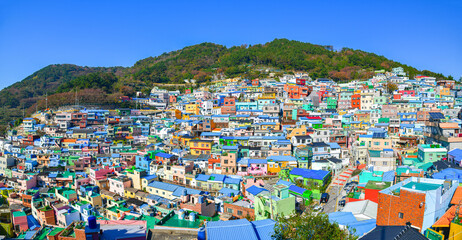 Panoramic view of colorful hillside houses at Gamcheon Culture Village overlooking Busan city and...