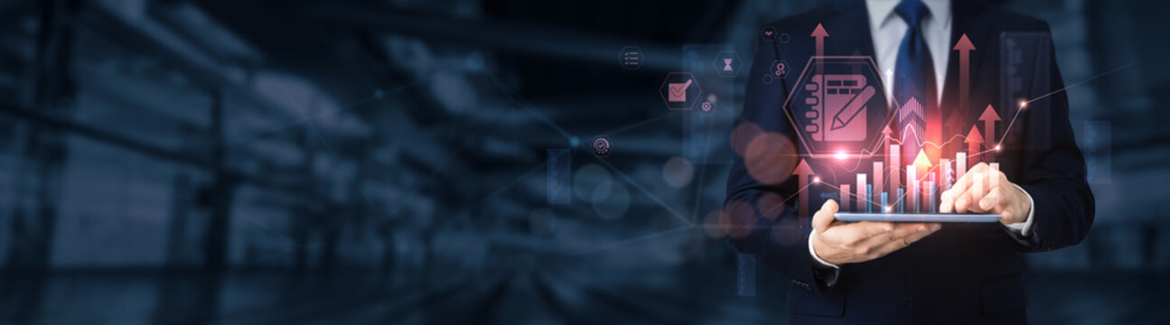 Businessman using a tablet for analyzing agenda data and information, meeting planning, schedule management, productivity tools, task organization, time management.