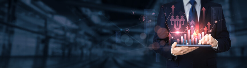 Businessman using a tablet for analyzing lead generation data and information, customer...